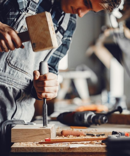 the-carpenter-works-with-a-tree